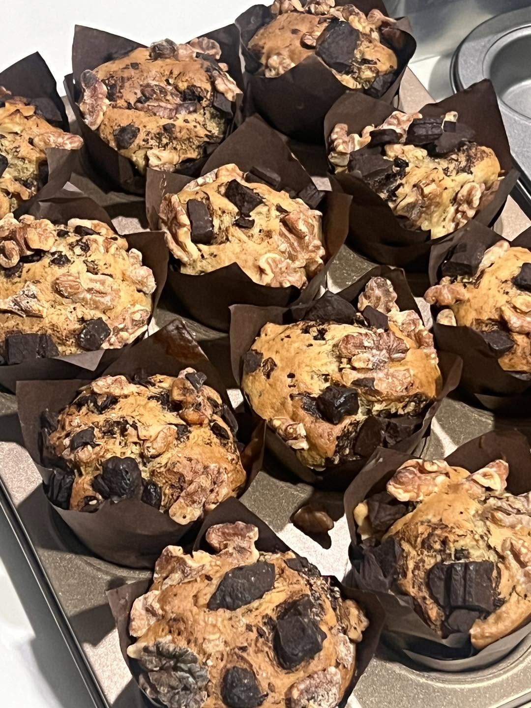 Loaded chocolate and walnut muffins in tulip wrappers, fresh from the Café Commissary oven